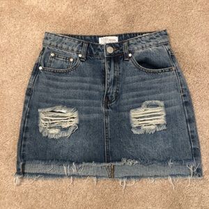 ALAGA HIGH RISE DISTRESSED VINTAGE WASH MINI SKIRT
